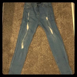 Distressed Fashion Nova Light wash jeans